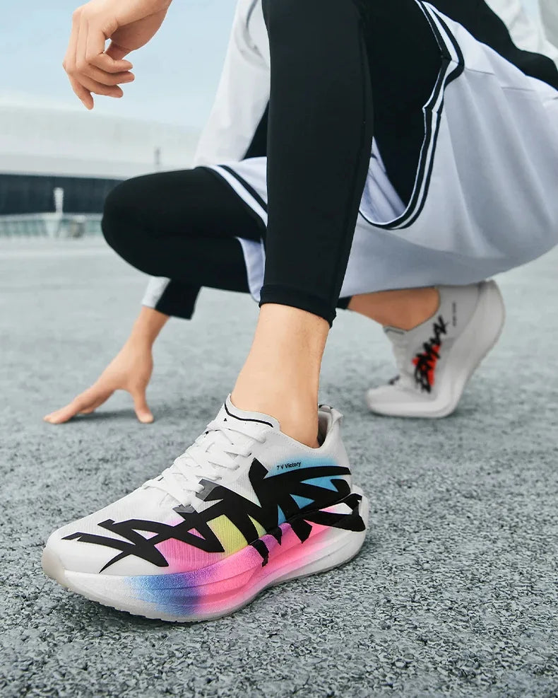 Runner crouched on a track in the Asphalt in White/Rainbow